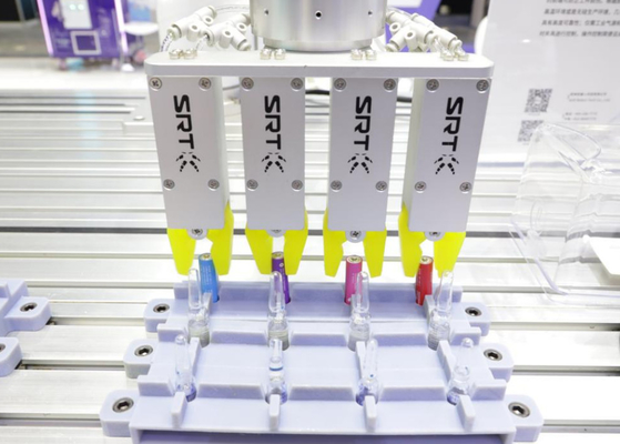 Pince indirecte d'entraînement de SLG montrant la prise des ampoules et des batteries